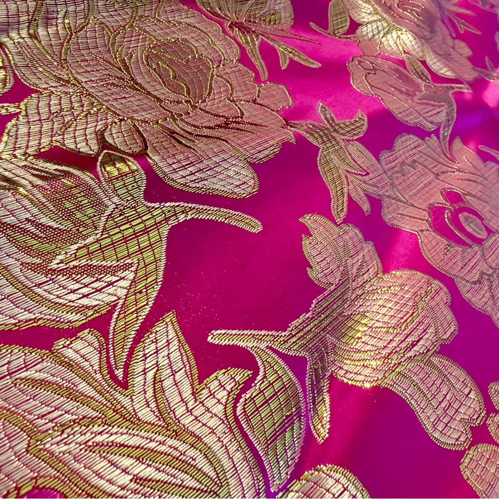 NEW. Gorgeous magenta brocade fabric with golden metallic threads.